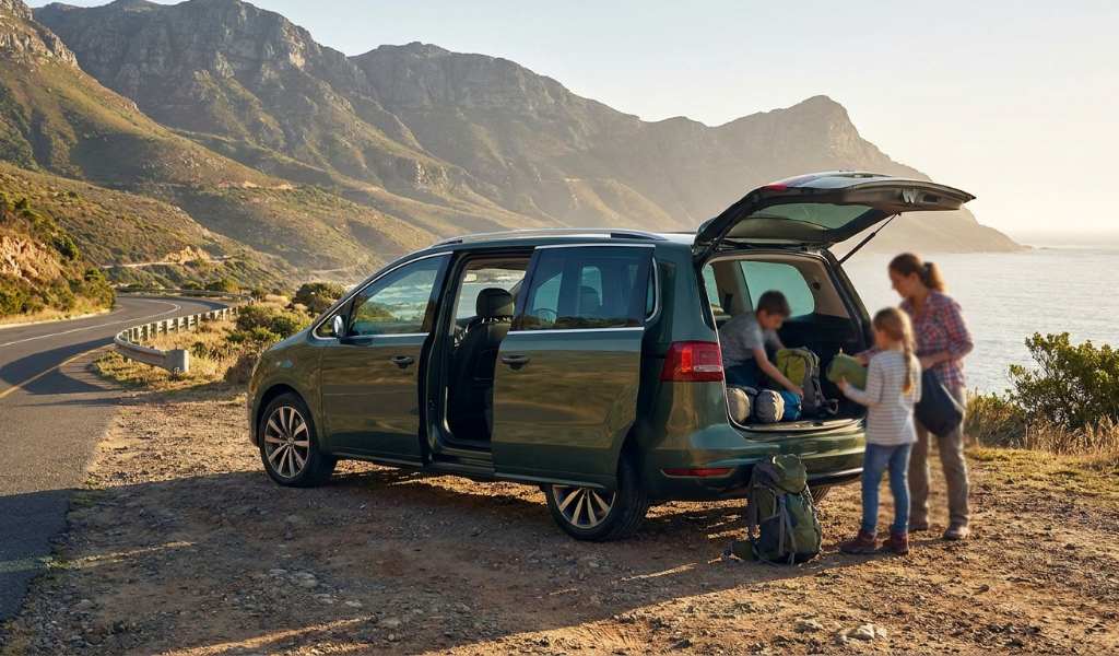 Family SUV packed and ready for a long highway road trip