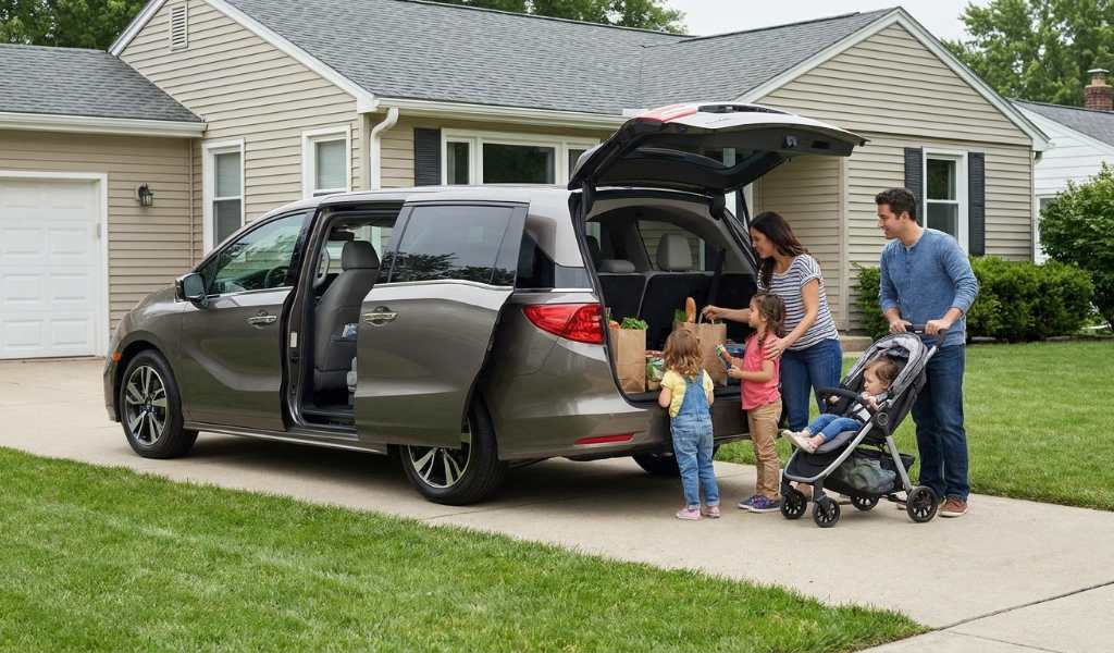 Parent installing a car seat in the back row for safety